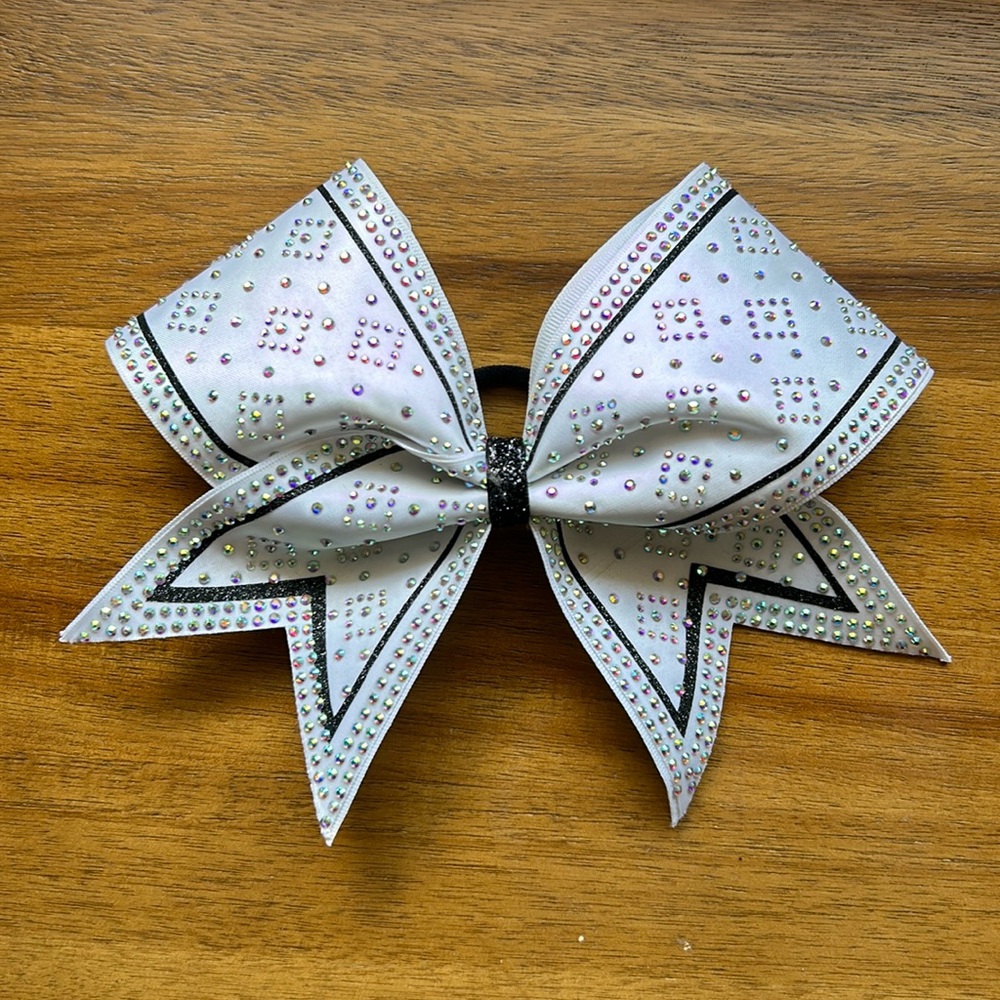 Large Cheer Bow White with Sparkles and Black Trim.